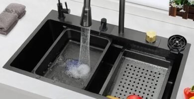 Modern stainless steel waterfall kitchen sink with digital display and pull-down sprayer