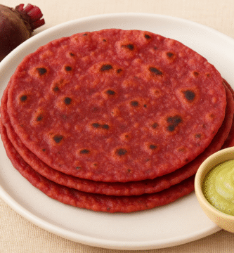 Colorful beetroot roti for babies on a plate with small pieces cut for 1 year old toddlers
