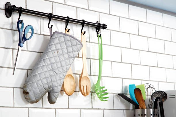 alt="Wall-Mounted Adhesive Hooks – Utilize Vertical Space"